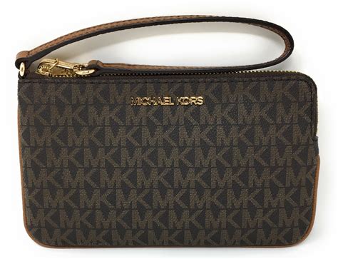 michael kors zip clutch wallet|Michael Kors large wristlet clutch.